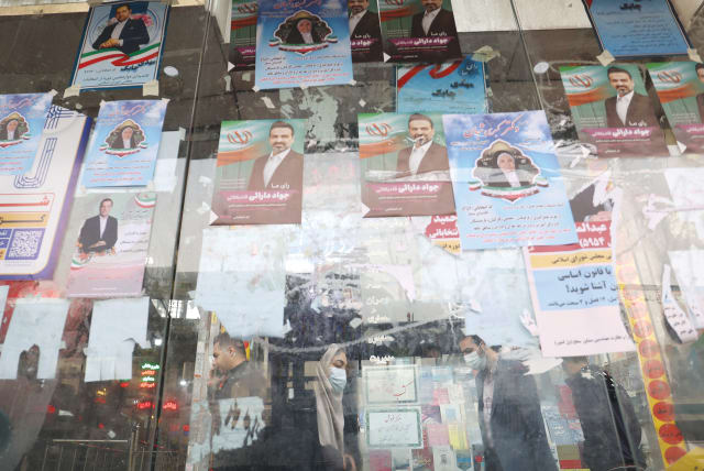  CAMPAIGN POSTERS are on display in Tehran ahead of the Iranian parliamentary election.  (photo credit: WEST ASIA NEWS AGENCY/REUTERS)