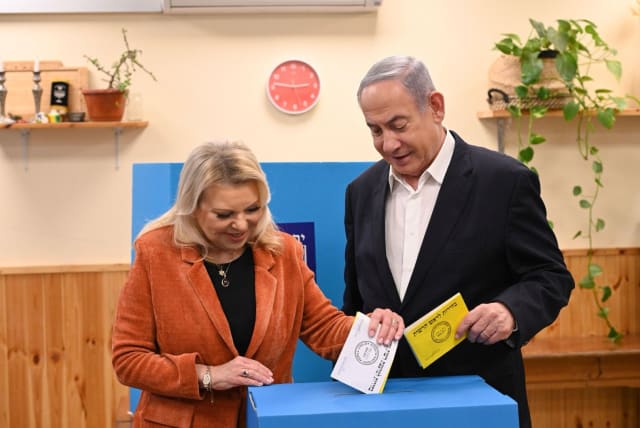  Prime Minister Benjamin Netanyahu and his wife Sara vote in the municipal elections in Jerusalem on February 27, 2024 (photo credit: CHAIM TZACH/GPO)