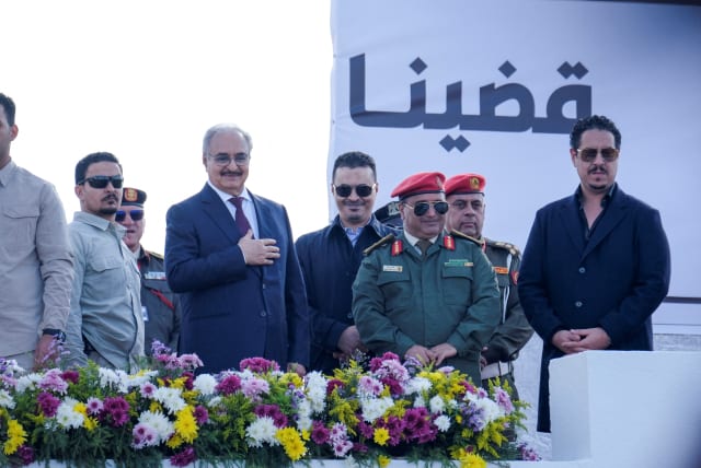  Libyan military commander Khalifa Haftar gestures to the crowd during Independence Day celebrations in Benghazi (photo credit: REUTERS/ESAM OMRAN AL-FETORI)