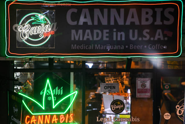  A sign "Made in U.S.A" is displayed in front of a cannabis shop, at Khaosan Road, one of the favourite tourist spots in Bangkok, Thailand, March 29, 2023 (photo credit: CHALINEE THIRASUPA/REUTERS)