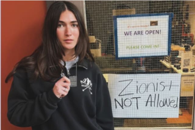  Tessa Veksler infront of hateful sign in Santa Barbara University (photo credit: SCREENSHOT/INSTAGRAM/@tessaveksler)