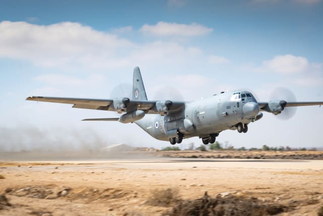  A C-130 Super Hercules. The aircraft can transport soldiers, gear, and water, and it can also be used to drop pamphlets of the type Israel has been dropping over Gaza to warn people to evacuate or to offer rewards for help finding hostages. (photo credit: IDF)