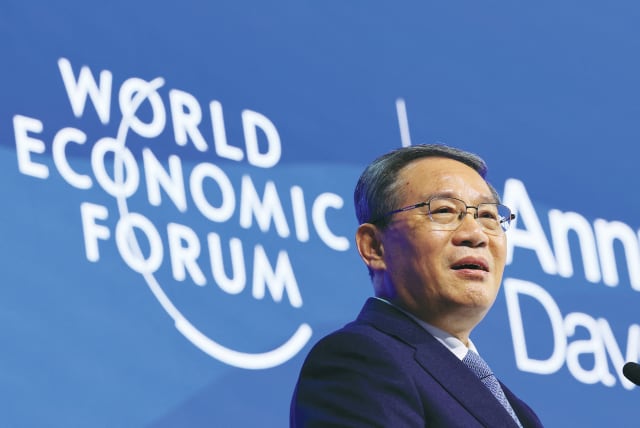  CHINA’S PREMIER Li Qiang speaks during the annual World Economic Forum in Davos, Switzerland, in January.  (photo credit: DENIS BALIBOUSE/REUTERS)
