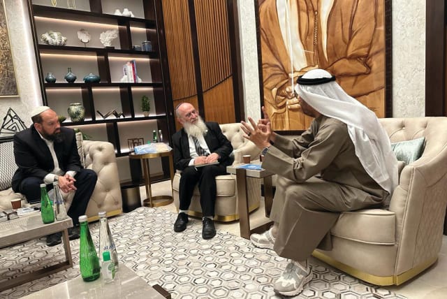  THE WRITER (center) meets in Dubai with Dr. Ali Rashid Al Nuaimi, chairman of the Defense Affairs, Interior and Foreign Affairs Committee of the UAE Federal National Council, and Rabbi Eyal Vered, an adult youth educator in religious Zionism.  (photo credit: Courtesy Ali Rashid Al Nuiami)