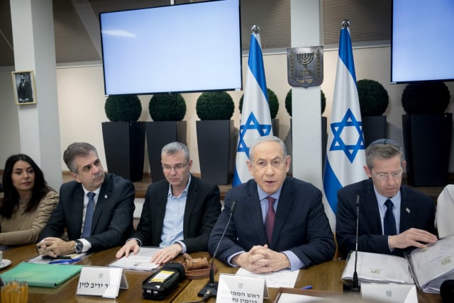  PRIME MINISTER Benjamin Netanyahu addresses a cabinet meeting. Considering the messaging coming out of the State Department, the unanimous cabinet vote against unilateral recognition of a Palestinian state was an open act of defiance against the US administration, says the writer. (photo credit: MIRIAM ALSTER/FLASH90)