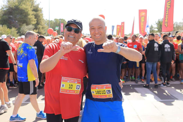  Glory is eternal! Trainer Itzik Weksler (R) with Maor Moshe Lion at a previous Jerusalem Winner Marathon. (photo credit: ARNON BOSSANI)