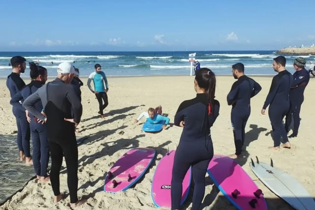   The surfing group of reservists and discharged reservists (photo credit: official website, photo: Kfar Saba Municipality)