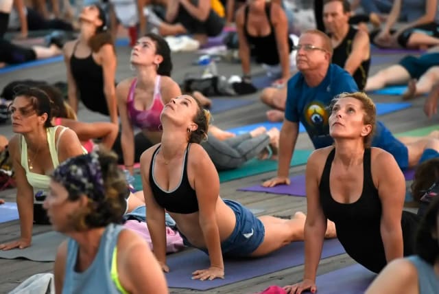  International Yoga Day at Tel Aviv Port on June 21. (photo credit: REUVEN CASTRO)