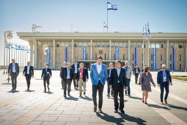  Florida Judge Roy Altman and his delegation of 14 US federal judges in front of Israel's Knesset. (photo credit: SHAHAR AZRAN)