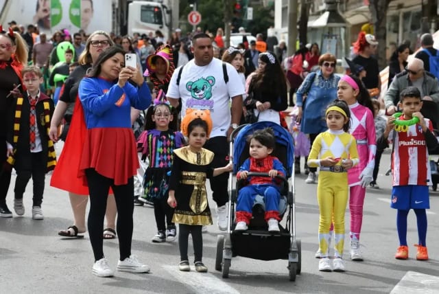   Purim celebrations last year. "The costume is only worn for one day, you can compromise and buy discounted costumes"  (photo credit: REUVEN CASTRO)