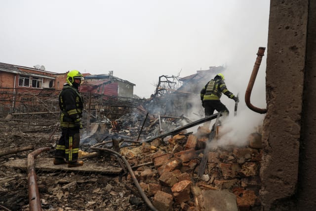  Rescuers work at the site of a residential area hit by a Russian missile strike, amid Russia's attack on Ukraine, in Odesa, Ukraine March 15, 2024. (photo credit: REUTERS/STRINGER)
