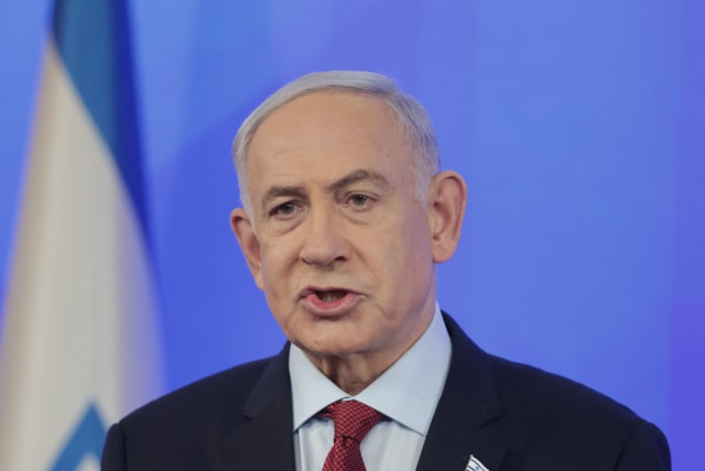  Israeli Prime Minister Benjamin Netanyahu holds a press conference at the Defense Ministry in Tel Aviv on February 29, 2024.  (photo credit: NIMROD KLIKMAN/POOL)