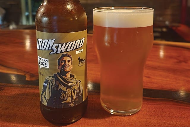  IRON SWORD, a New England India Pale Ale brewed by Six-Pack (Super Heroes Beers) in memory of Sgt. Shoham Moshe Ben-Harush of the IDF’s Nachal Brigade. (photo credit: Courtesy the breweries)