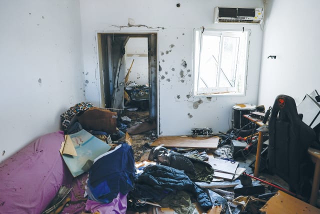  A HOME in Kibbutz Kfar Aza is bullet-ridden and ransacked following the October 7 massacre. Marwan Issa was a principal planner of that rampage against defenseless Israeli civilians, the writer notes.  (photo credit: EVELYN HOCKSTEIN/REUTERS)