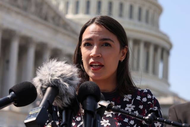  U.S. Representative Alexandria Ocasio-Cortez (D-NY) speaks at a press conference on psychedelics in the National Defense Authorization Act (NDAA) in Washington, U.S., July 13, 2023. (photo credit: REUTERS/Kevin Wurm)