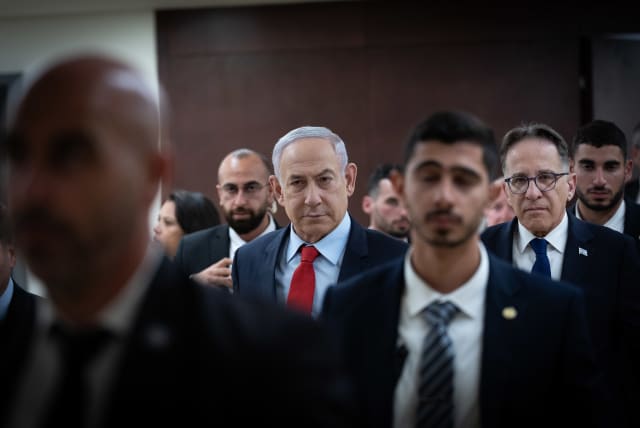  Israeli Prime Minister Benjamin Netanyahu walking outside his office at the Knesset, Israel's parliament in Jerusalem on March 13, 2024. (photo credit: YONATAN SINDEL/FLASH90)