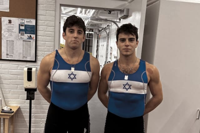  NATHAN (left) and Asher Swidler pose in their specially designed pro-Israel unisuit, which they use as members of the Brown Crew Team.  (photo credit: Zachary Atalay/Courtesy)