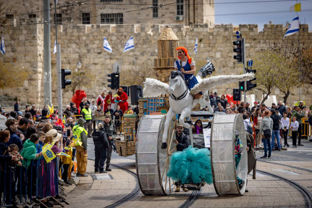  THE PURIM ‘Adloyada’ parade takes place in Jerusalem on Monday. Purim represents the first step in our redemption; Passover propels us ever closer to the never-fully-reachable finish line, says the writer. (photo credit: YONATAN SINDEL/FLASH90)