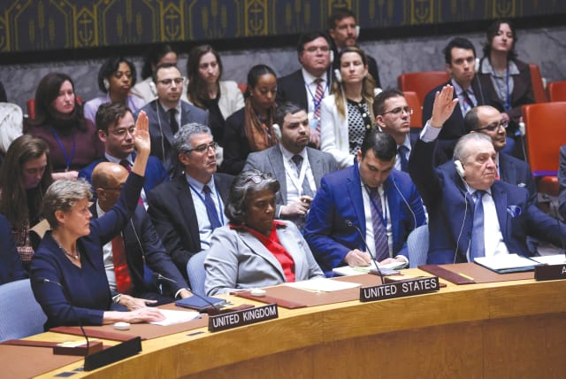  US Ambassador to the United Nations Linda Thomas-Greenfield is flanked by the Algerian and UK representatives who voted on Monday in favor of a Security Council resolution demanding an immediate Gaza ceasefire and the immediate and unconditional release of all hostages. The US abstained. (photo credit: Andrew Kelly/Reuters)