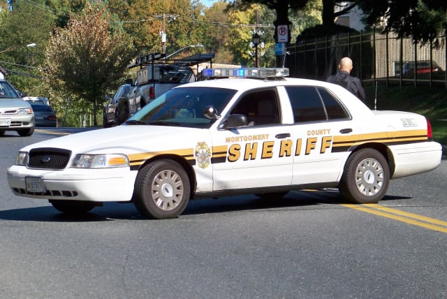   A Montgomery County Sheriff's Office vehicle blocks off a street where a car fire had occurred in Silver Spring, Maryland. (photo credit: BEN SCHUMIN/CREATIVE COMMONS SHARE-ALIKE 3.0 HTTPS://CREATIVECOMMONS.ORG/LICENSES/BY-SA/3.0/DEED.EN)