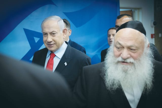  Housing Minister Yitzhak Goldknopf, leader of United Torah Judaism, arrives for a cabinet meeting together with Prime Minister Benjamin Netanyahu. (photo credit: CHAIM GOLDBEG/FLASH90)