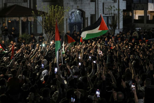  People protest in support of Palestinians in Gaza, amid the ongoing conflict between Israel and the Palestinian Islamist group Hamas, near the Israeli embassy in Amman, Jordan, March 28, 2024. (photo credit: REUTERS/Alaa Al-Sukhni)