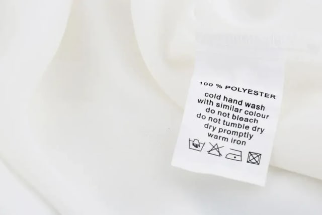  Always always start by checking the instructions on the label. Label with washing instructions (photo credit: SHUTTERSTOCK)