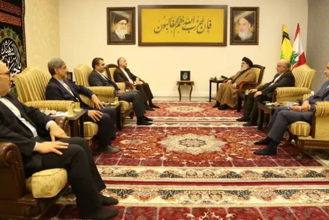 Nasrallah in a meeting with Iran's foreign minister (photo credit: Handout via Reuters)