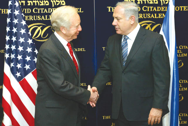  Then-US Senator Joe Lieberman meets Prime Minister Benjamin Netanyahu in Jerusalem in 2009, following a Knesset election that would soon return Netanyahu to the Prime Minister's Office. (photo credit: OLIVIER FITOUSSI/FLASH90)