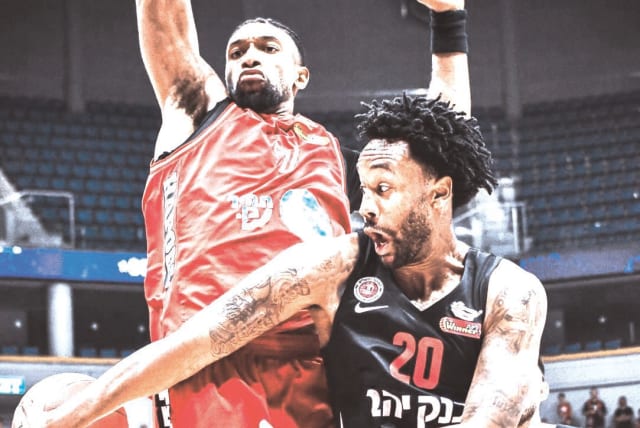 HAPOEL JERUSALEM’S Levi Randolph passes around Hapoel Tel Aviv’s Kyle Alexander during the Capital City Reds’ 84-79 State Cup quarterfinal victory over Hapoel Tel Aviv, which parted ways with coach Danny Franco (inset) after the contest. (photo credit: YEHUDA HALICKMAN)