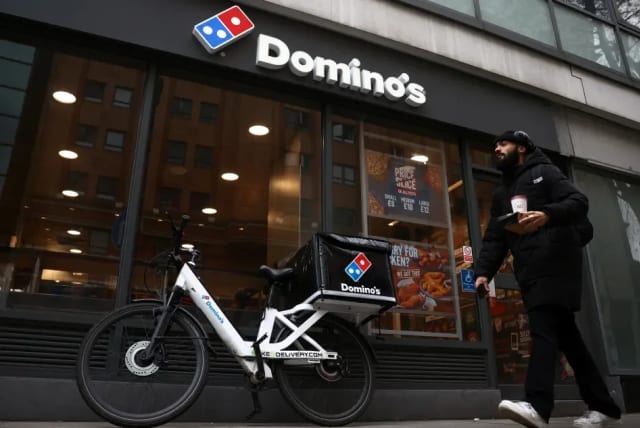  Domino's Pizza  (photo credit: REUTERS/HENRY NICHOLLS)