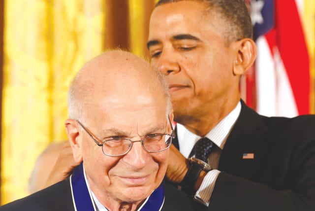  THEN-US PRESIDENT Barack Obama presents the Presidential Medal of Freedom to Daniel Kahneman at the White House, in 2013. (photo credit: LARRY DOWNING/REUTERS)