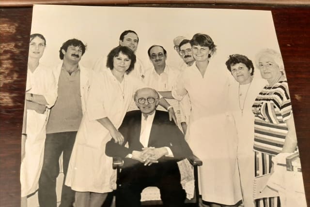  MENACHEM BEGIN with the Shaare Zedek care team. Writer Dvora Waysman at R; directly behind him are (L) Prof. Jonathan Halevy, director-general; and Dr. Efraim Meltzer, his physician. (photo credit:  COURTESY DVORA WAYSMAN)