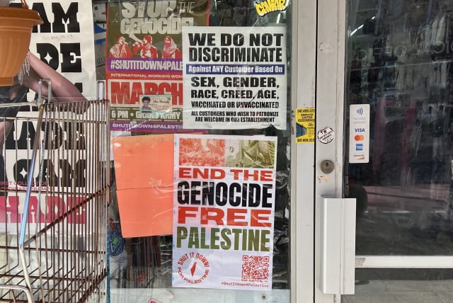  ‘FREE PALESTINE’ poster on a Brooklyn storefront. (photo credit: BRIAN BLUM)