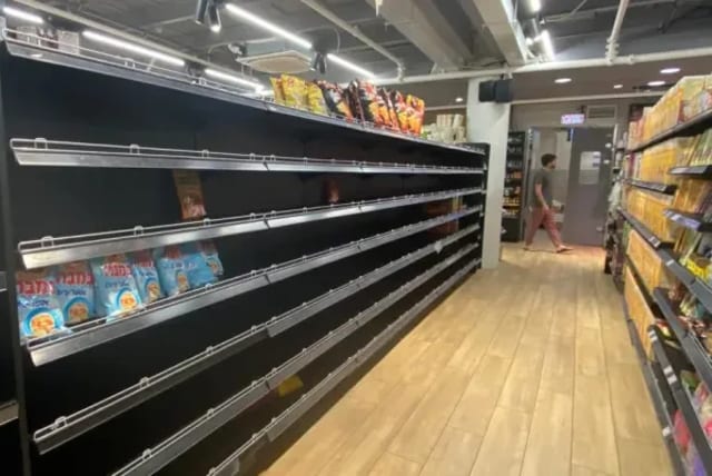  Empty shelves in stores in Israel  (photo credit: AVSHALOM SASSONI)