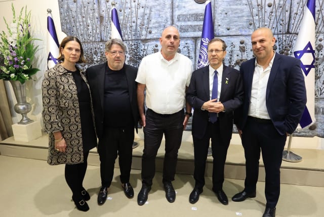  ALUT celebrates 50 years at the annual event at the President's House. On the right Gadi Weinreb, Isaac Herzog, Dadi Atas, Ran and Hila Rahav. (photo credit: Dudi Zada)