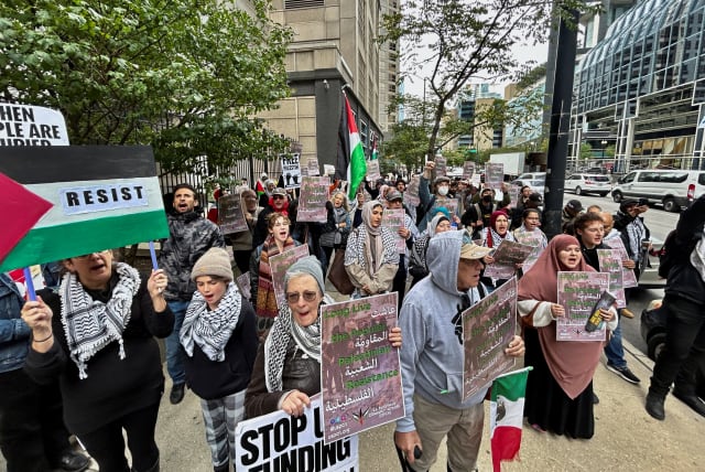  Palestinian-Americans and their supporters protest as the conflict between Israel and the Palestinian militant group Hamas continues, outside the Israeli consulate in downtown Chicago, US, October 8, 2023. (photo credit: REUTERS)