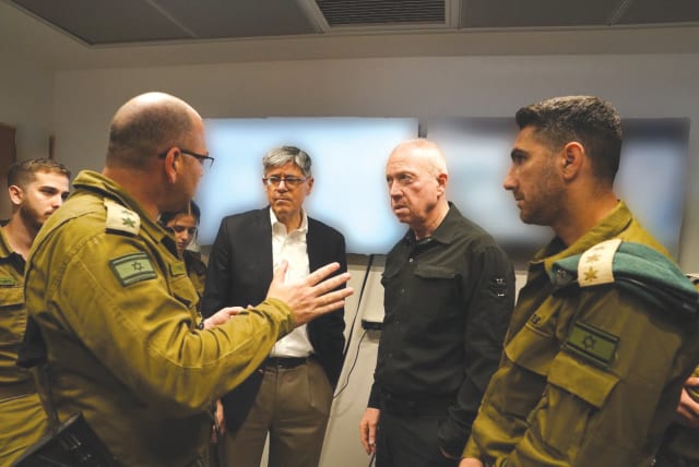  DEFENSE MINISTER Yoav Gallant (second right) and US Ambassador Jack Lew (third right) are briefed at Southern Command. (photo credit: ARIEL HARMONI/DEFENSE MINISTRY)