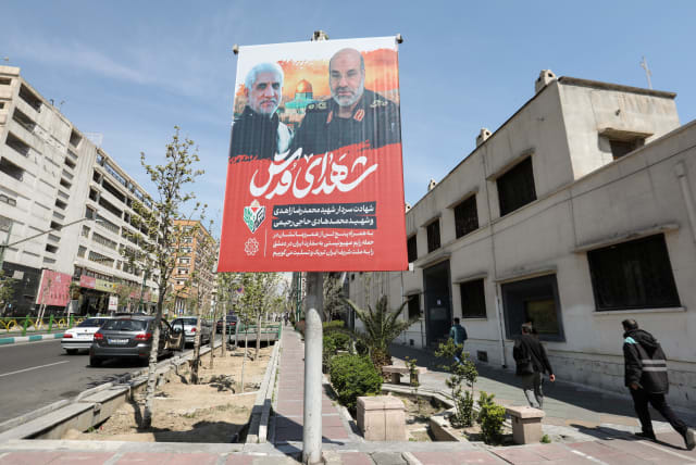  PORTRAIT OF IRGC generals Mohammad Reza Zahedi and Mohammad Hadi Haj Rahimi, slain in an April 1 Israeli airstrike and noted as ‘Martyrs of Quds’ [Jerusalem], seen on a Tehran street.  (photo credit: Atta Kenare/AFP via Getty Images)