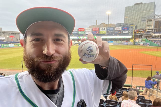  Eitan Levine threw out the ceremonial first pitch at the Hartford Yard Goats game, April 10, 2024, in Hartford, Connecticut.  (photo credit: Courtesy)