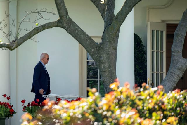 US President Joe Biden walks to the Oval Office at the White House in Washington, US, April 13, 2024. The president returned to the White House from Wilmington, Delaware to consult with his national security team after Iran said it launched dozens of attack drones at Israel. (photo credit: Bonnie Cash/Reuters)