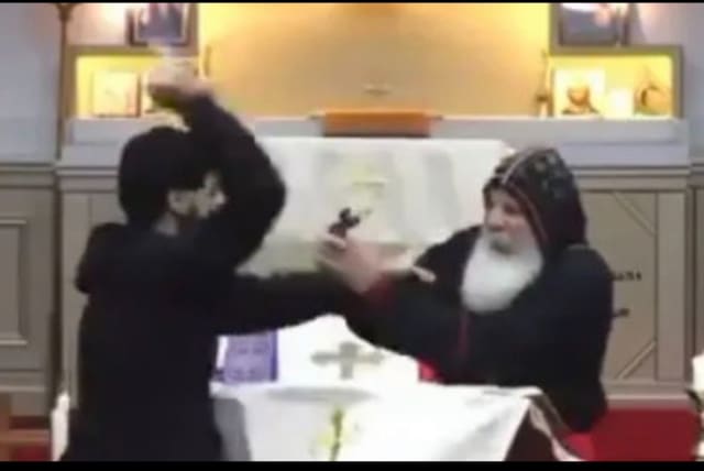  A screenshot from a live-streamed church service, during which Assyrian Bishop Mar Mari Emmanuel was attacked.  (photo credit: FAIR USE VIA X)