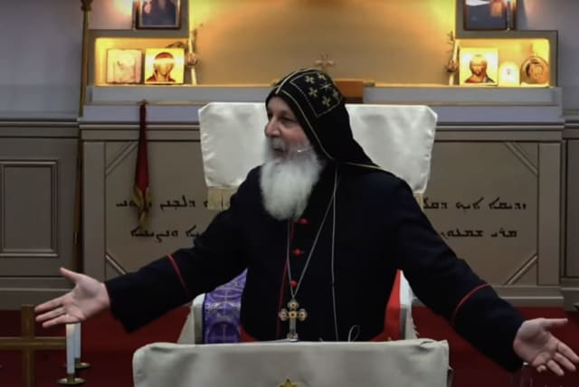  Bishop Mar Mari Emmanuel gestures during a sermon, in this screenshot from a video on YouTube. (photo credit: SCREENSHOT / https://tinyurl.com/4vhn64k6)