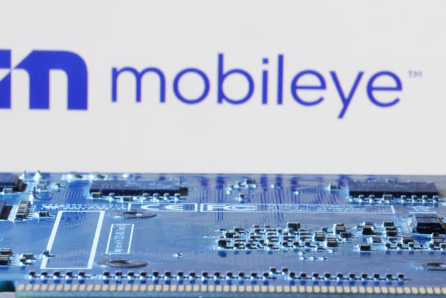  Mobileye logo is seen near computer motherboard in this illustration taken January 8, 2024. (photo credit: REUTERS/DADO RUVIC/ILLUSTRATION)