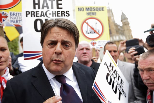 Far-right British National Party (BNP) leader Nick Griffin attends a protest against the killing of a British soldier in London June 1, 2013. Police intervened to separate about 150 far-right protesters from a much larger anti-racism crowd in London on Saturday to stop them from coming to blows over (photo credit: OLIVIA HARRIS/ REUTERS)