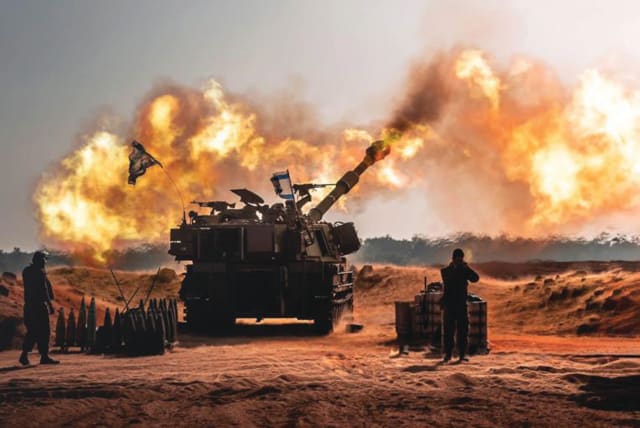  AN ISRAELI M109 howitzer fires artillery shells. (photo credit: IDF SPOKESPERSON'S UNIT)