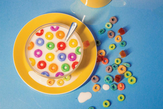  An illustrative image of a bowl of Fruit Loops and milk. (photo credit: Jessica Neve/Unsplash)