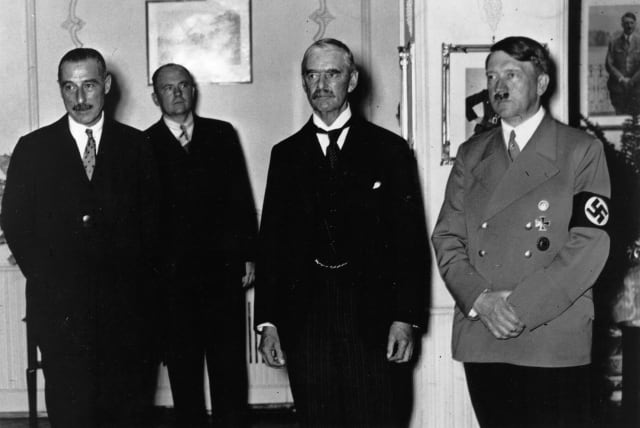  BRITISH PRIME minister Neville Chamberlain (second from right) with Adolf Hitler in Munich in September 1938 during the signing of the Munich Pact, which acceded to Hitler’s demand that the Sudetenland be ceded to Germany. (photo credit: Photo by Keystone/Getty Images)