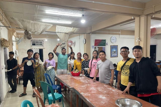  Community members actively engaging in matzah baking at the Shavei Israel community center located in Churachandpur, Manipur, and Aizawl, Mizoram. (18/4/2024) (photo credit: SHAVEI ISRAEL)