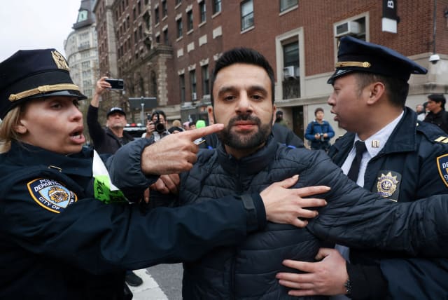  Israeli Arab activist Yoseph Haddad shortly after being physically assaulted by a pro-Palestinian demonstrator at a protest near the Columbia University. (photo credit: REUTERS/CAITLIN OCHS)